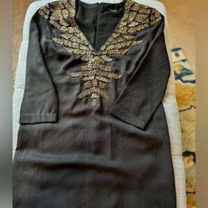Women’s Marciano dress with beaded detail. NWOT SIZE 6 black dress